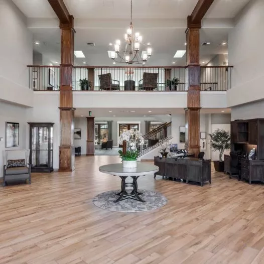 Agoura Hills entry hall with chandelier and table with flowers