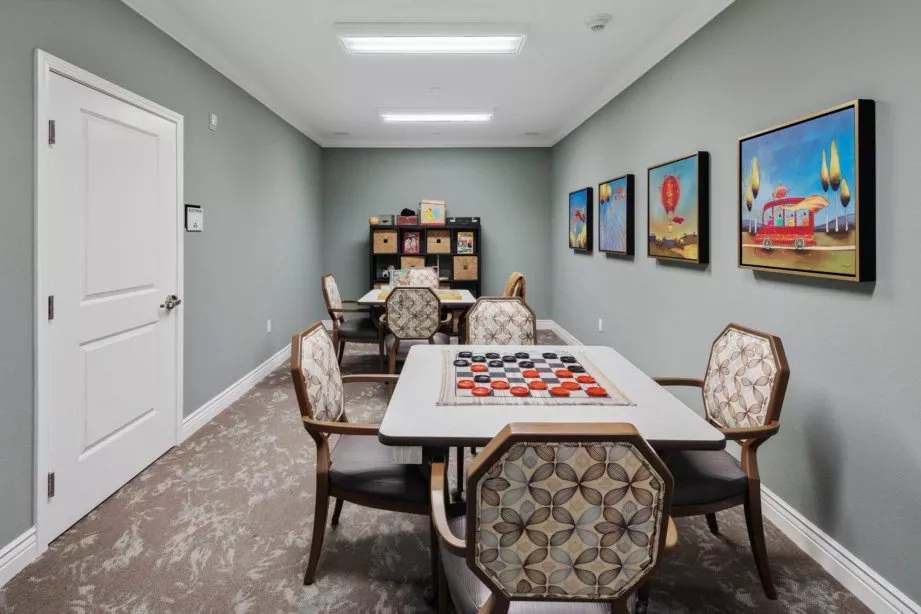 East Sacramento activity room with game tables