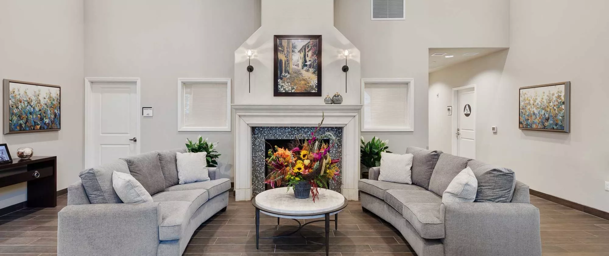 East Sacramento lounge with sofas and fire place