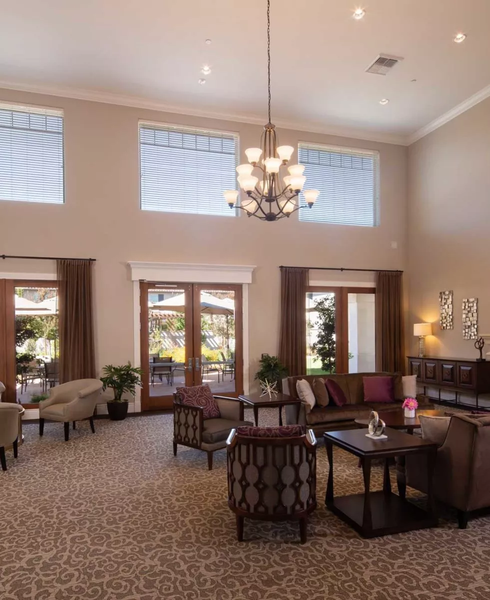 Fair Oaks lounge with seating areas and fire place