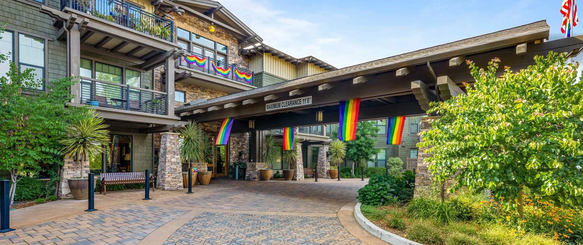 Fountain grove building with pride flags hanging outside