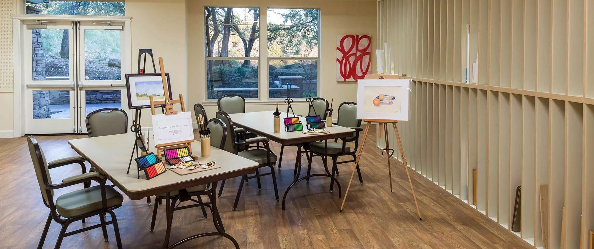 Fountaingrove Lodge art studio with painting supplies, brushes and easel