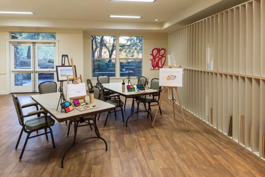 Fountaingrove Lodge art studio with painting supplies, brushes and easel