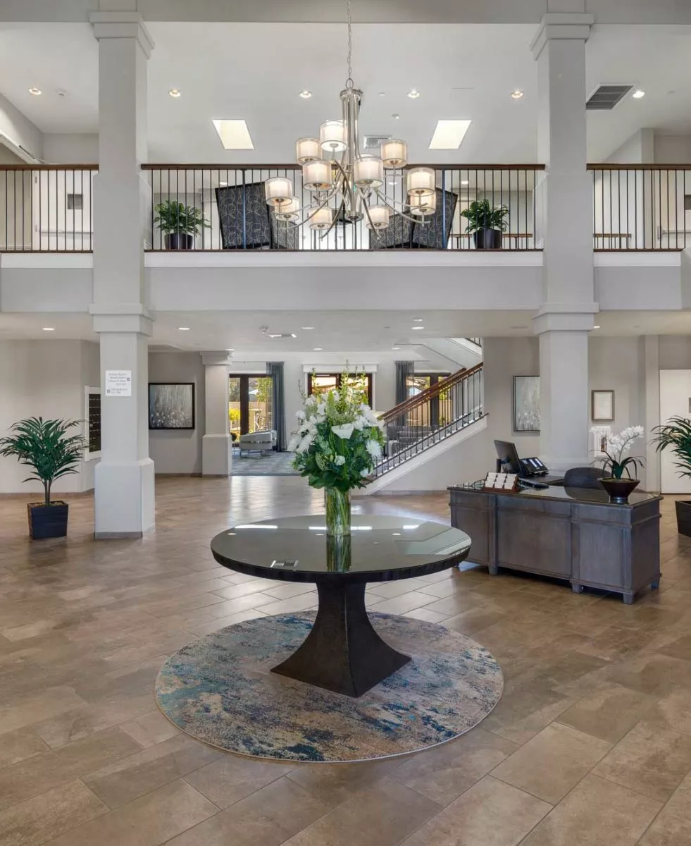 Riverpark elegant entry hall with chandelier