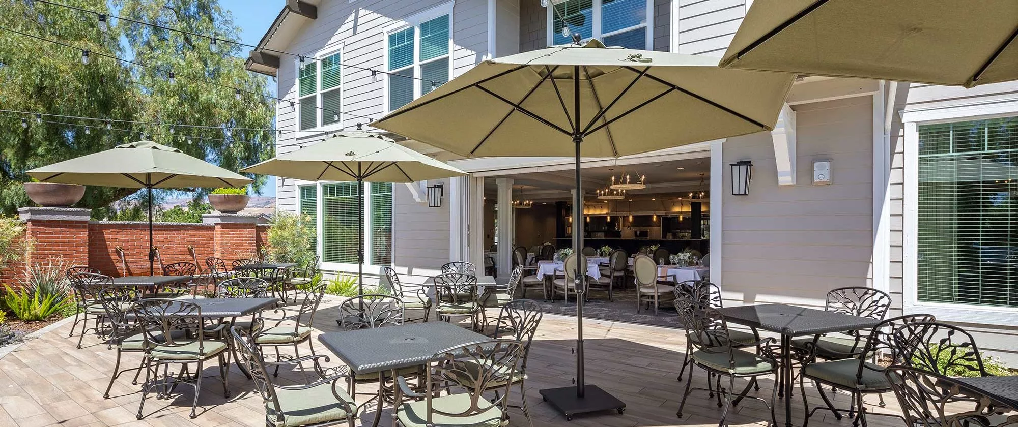Silver Creek Patio with tables and umbrellas
