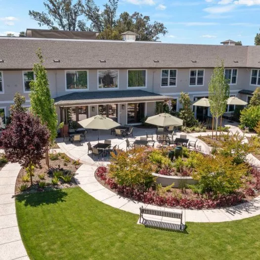 Silver Creek Aerial view of building with garden and patio
