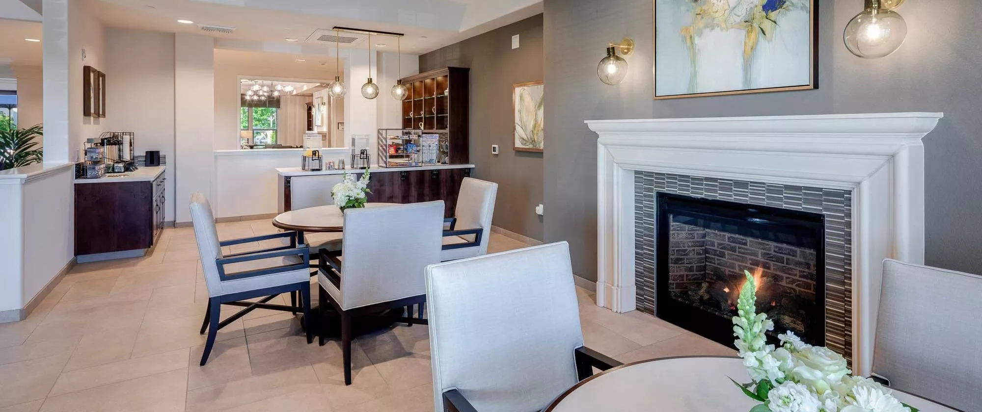 Westpark bistro with chairs, tables and fire place