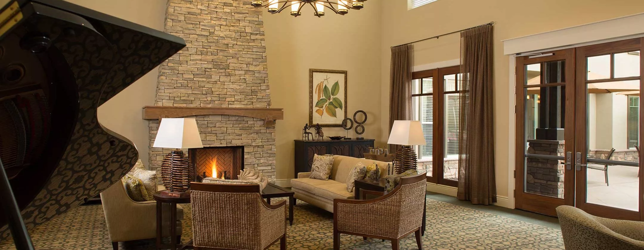 Whittier lounge with fire place and piano