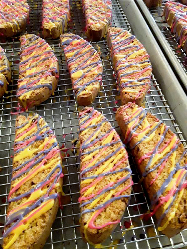 Easter themed biscotti on a cooling rack
