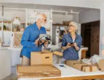 Senior couple moving into an assisted living community