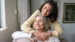 Daughter and mother at a memory care facility